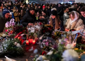 Parents are desperately searching for children after Swiss ski resort inferno as hundreds gather for heartbreaking vigil