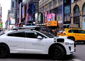 A Waymo autonomous self-driving Jaguar electric vehicle is seen in the Manhattan borough of New York City, on Dec.13. Waymo robotaxis are active in several large U.S. cities, sometimes presenting odd -- or dangerous -- challenges for police and those around them.