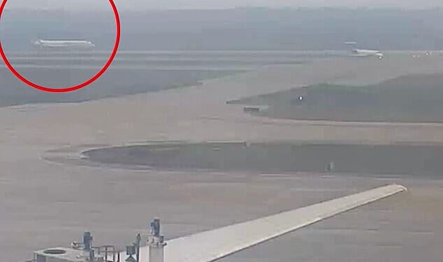 New surveillance footage shows the moment a United Boeing 737 MAX skidded while coming into land on a wet runway in 2024