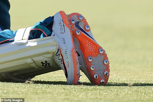 Khawaja was sanctioned for writing a slogan on his playing shoes (pictured) which was linked to the ongoing conflict in the Middle East