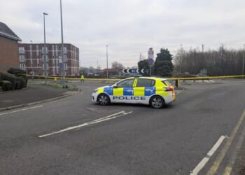 Man, 48, killed and woman, 50, fighting for her life after crashing into roundabout & veering off road on New Year's Eve