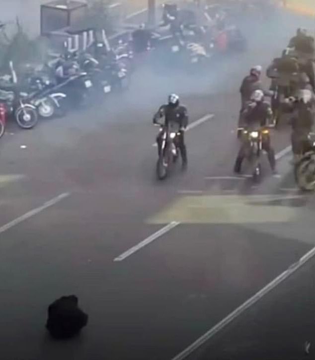 On Wednesday, a photo of a lone demonstrator defiantly sitting on the road in front of armed security forces drew parallels to the 'Tank Man' snap taken during the 1989 Tiananmen Square protests
