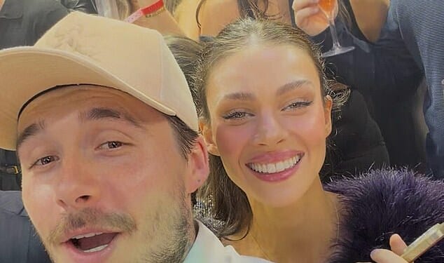 Nicola Peltz appeared to be showing off updated teeth as she posed with husband Brooklyn on NYE