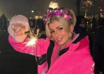 Shocking moment influencer is attacked TWICE & hit with ‘firework’ as wild NYE street parties descend into total anarchy