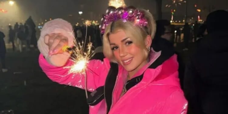 Shocking moment influencer is attacked TWICE & hit with ‘firework’ as wild NYE street parties descend into total anarchy