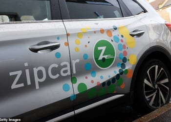 Car sharing firm Zipcar has suspended its UK operations pending a consultation with its employees over whether to quit Britain altogether (pictured: a Zipcar parked in London)
