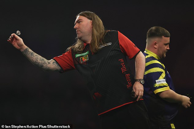The 38-year-old was a window cleaner before becoming a professional darts player