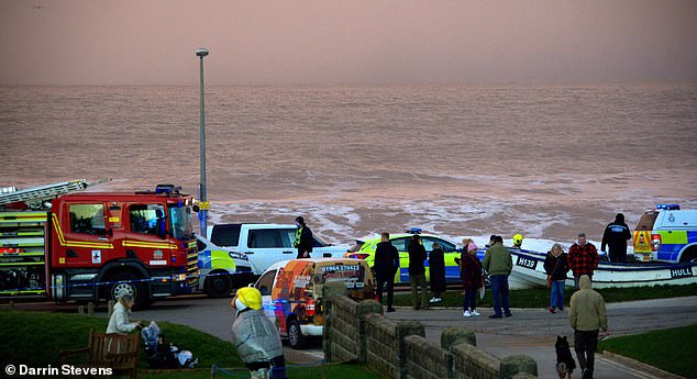 Crews remain on the promenade and have urged residents to avoid the area