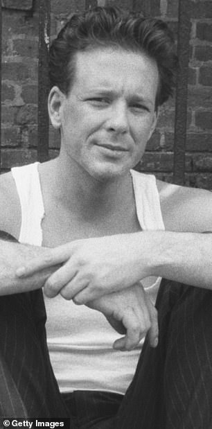 For years, Rourke's ever-changing appearance sparked speculation, which he later clarified was largely due to botched reconstructive surgeries meant to repair damage from his boxing career; pictured 1985