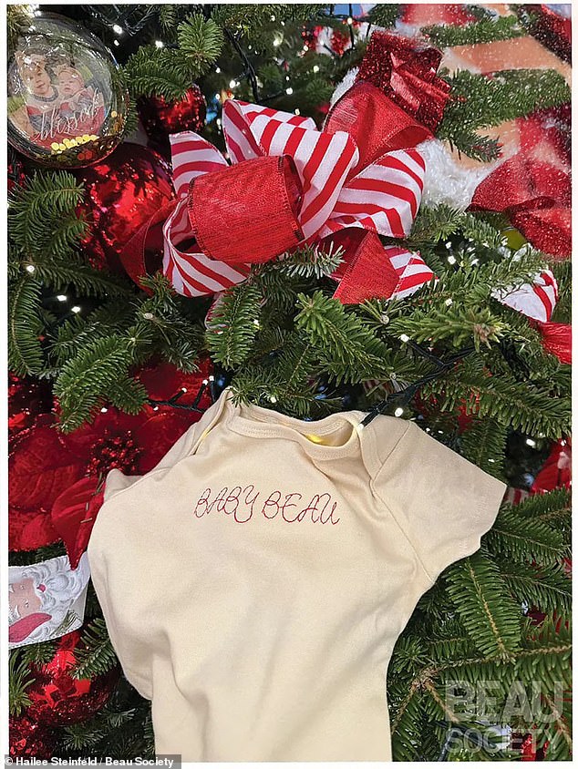 A onesie was seen in another picture as it was placed on a Christmas tree with 'Baby Beau' embroidered on the front