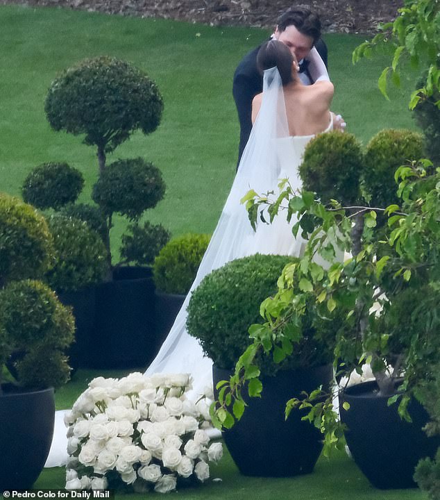 The pair - who were first romantically linked in 2023 - said 'I do' during a romantic ceremony this past May in Santa Barbara (seen above)