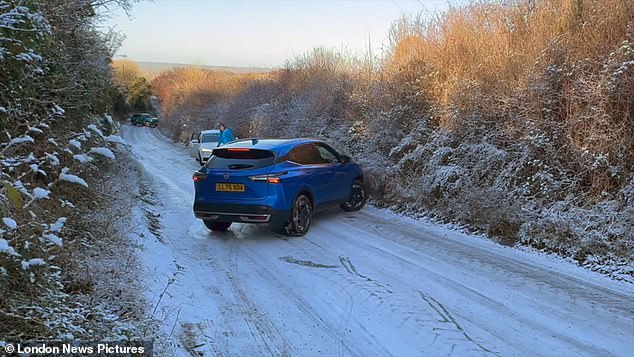 One dramatic video today showed a car colliding with another vehicle after the driver lost control on thick ice in a country road near Ivinghoe in Buckinghamshire