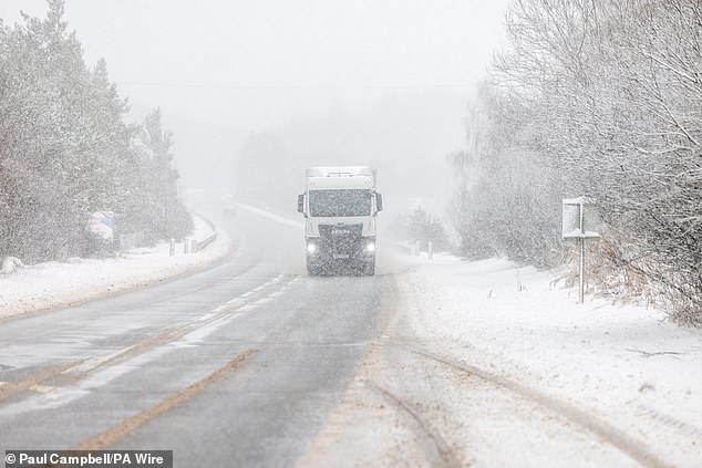 Traffic built up on the A9, south of Inverness, amid falling snow and worsening conditions