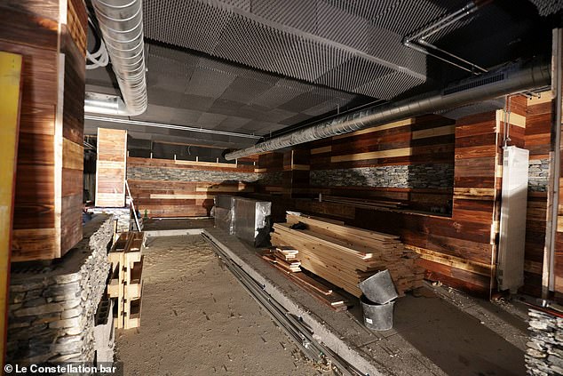 Images from social media show the works underway, with the panelling - which is believed to have caught fire and started the blaze - being installed on the ceiling