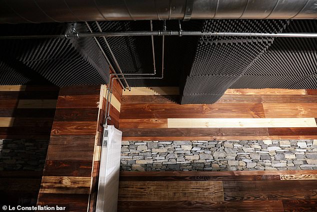 Images from 2015 show the panelling on the ceiling of Le Constellation bar - investigators believe this is what caught fire and started the blaze