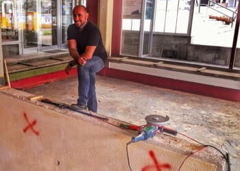 Jacques Moretti, 49, who is the owner of a Swiss nightclub where dozens of people were killed in a horrific blaze on New Year's Eve can be seen taking part in the building's renovation works shortly after they purchased the site in 2015