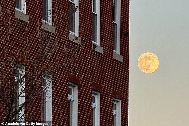 In Baltimore, USA, the supermoon was seen rising over the city