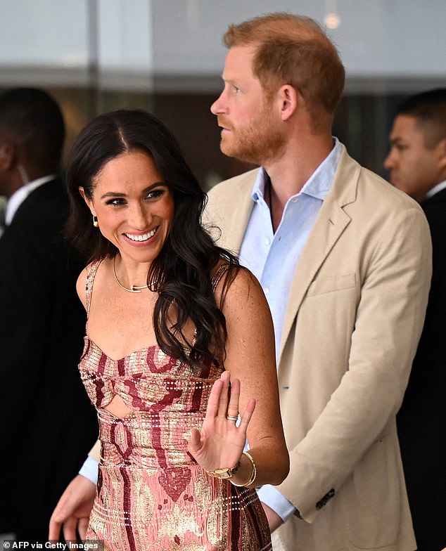 Ms James said: 'This looks like a microscopic example of what happens when the "red carpet" double-act choreography goes awry'. She described Meghan's behaviour as 'openly correctional'