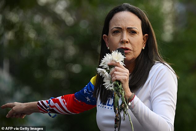 Venezuelan opposition leader Maria Corina Machado addresses supporters during a protest called by the opposition on the eve of the presidential inauguration in Caracas on January 9, 2025