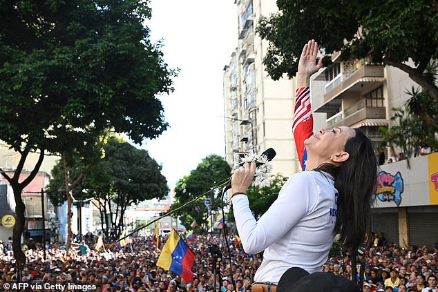 Venezuelan opposition leader Maria Corina Machado addresses supporters during a protest called by the opposition on the eve of the presidential inauguration, in Caracas on January 9, 2025