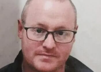 Murderer among two prisoners on the run after escaping jail on New Year's Day as cops urge 'do not approach'