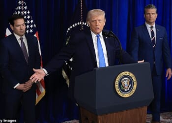 President Donald Trump (center) suggested that Secretary of State Marco Rubio (left) and Defense Secretary Pete Hegseth (right) would be running Venezuela for the foreseeable future