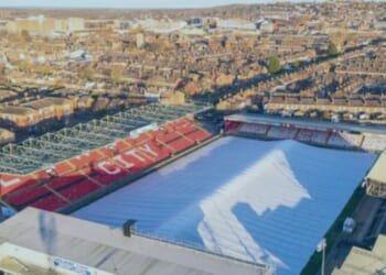 EFL forced to step in as 11,000-capacity stadium's pitch is covered by giant TENT