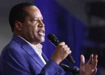 Republican radio talk show host Larry Elder speaks to guests at Ashley's BBQ Bash hosted by Rep. Ashley Hinson on Aug. 6, 2023, in Cedar Rapids, Iowa.