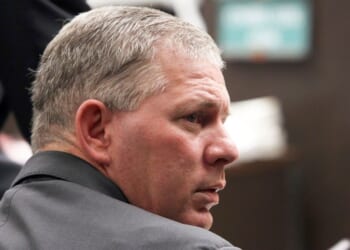 Former baseball player Lenny Dykstra sits during his sentencing for grand theft auto in Los Angeles, California, on Dec. 3, 2012.