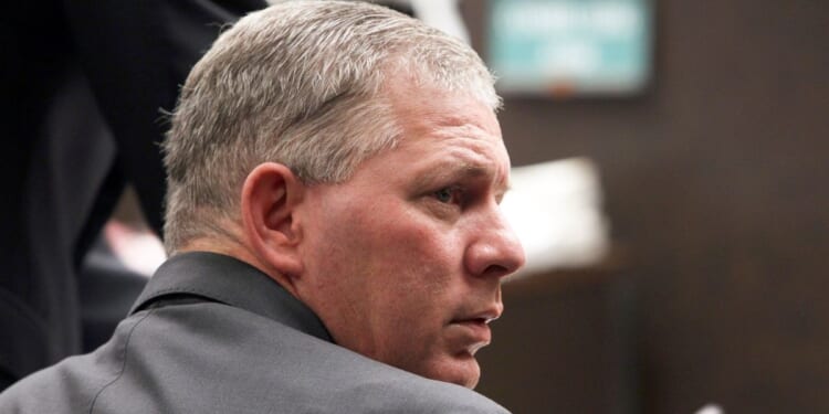 Former baseball player Lenny Dykstra sits during his sentencing for grand theft auto in Los Angeles, California, on Dec. 3, 2012.