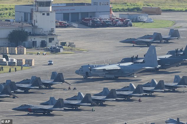 Military aircraft parked at Jose Aponte de la Torre Airport in Ceiba, Puerto Rico on Saturday. More than 150 planes including fighters, bombers and drones were deployed to guarantee the success of the Maduro mission