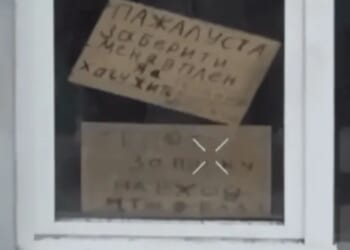 Moment Russian soldier holds sign pleading to be taken prisoner by Ukraine