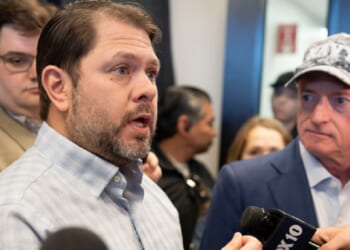 Arizona Democratic Sen. Ruben Gallego speaks to reporters in a March file photo.