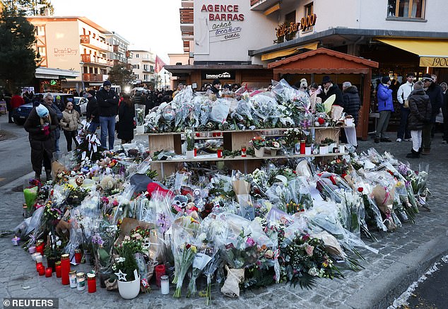 A makeshift memorial outside the "Le Constellation" bar following the fire