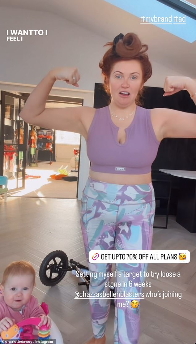 The star also shared a clip with fans where she confessed to gaining 4lbs over Christmas as she stood in a purple and workout set with her youngest Gigi