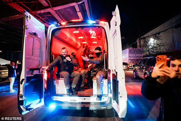 Maduro was seized following a raid on his compound in Caracas in the early hours of Saturday. Pictured: DOJ officers leave the Metropolitan Detention Center in Brooklyn