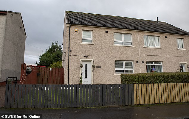 The modest property is covered with religious artefacts and snaps from her meetings with various big stars