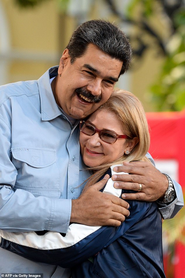 Maduro, pictured with his wife Flores in 2019, was serving his third presidential term when the pair was captured by US forces