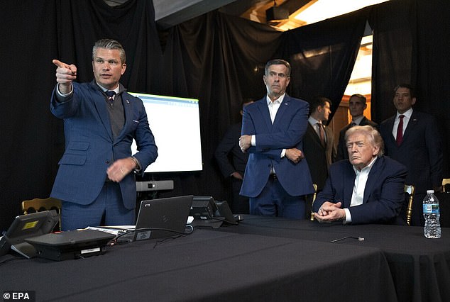 A handout picture made available by the White House Press Office shows US President Donald Trump alongside US Secretary of War Pete Hegseth (left) and CIA Director John Ratcliffe (center), watching 'Operation Absolute Resolve'
