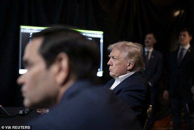 US President Donald Trump sitting next to US Secretary of State Marco Rubio as they watch the US military operation in Venezuela