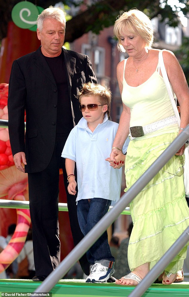 Victoria's parents Tony and Jackie with Brooklyn in 2005