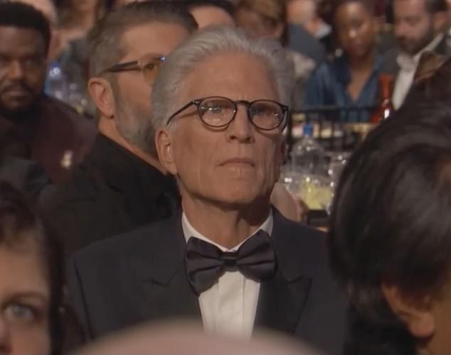 The camera flashed on Reiner's close friend Ted Danson