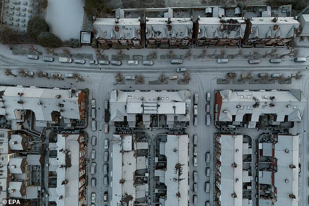 LIVERPOOL -- An aerial photograph taken with a drone shows snow covering rooftops in the Mossley Hill, January 4, 2026