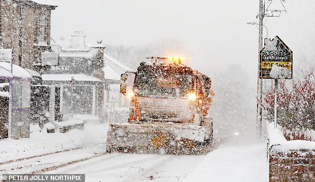 SCOTLAND -- A snow plough struggles through the snow on the A9 at Brora in the Scottish Highlands on January 4, 2026