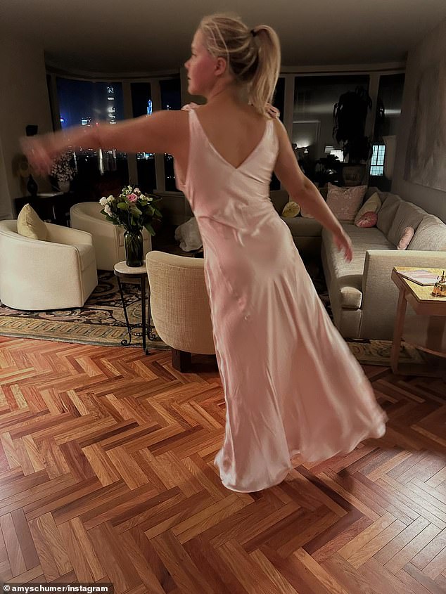 She later changed into a pink silk nightgown