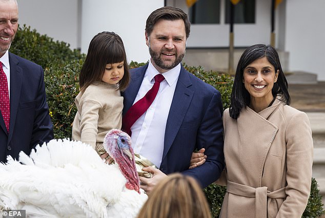 Vice President JD Vance (C), alongside his daughter Mirabel (L) and Second Lady Usha Vance (R) pose next to a pardoned turkey named Gobble in the Rose Garden of the White House in Washington, DC, USA, 25 November