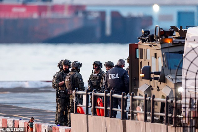 DEA agents wait for the arrival of captured Venezuelan President Nicolas Maduro at the Downtown Manhattan Heliport, ahead of Maduro's initial appearance at Daniel Patrick Moynihan courthouse in Manhattan on January 5