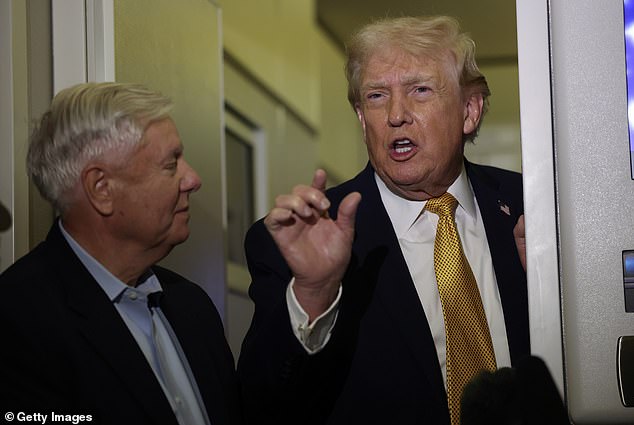 President Donald Trump, seen on Air Force One on Sunday, hailed his government's 'brilliant' capture of Maduro in the early hours of Saturday