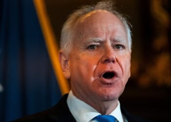 Minnesota Gov. Tim Walz speaks Monday during a press conference at the State Capitol building in St. Paul, Minnesota. Walz announced that he is abandoning his re-election campaign for governor, blaming scrutiny from President Donald Trump for his decision.
