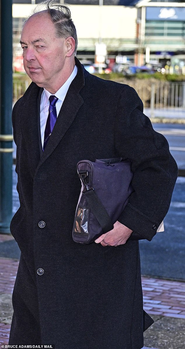 Jonathan Carley, 65, arriving at court in Llandudno where he pleaded guilty to wearing uniform or dress bearing the mark of His Majesty's forces without permission